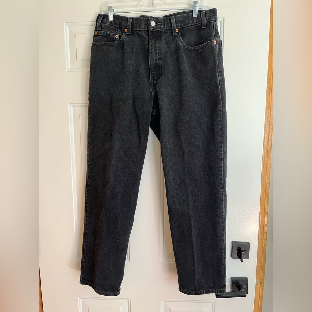 Vintage men’s Levi’s black 550 relaxed fit 36x 30 denim jean. 04-2001.